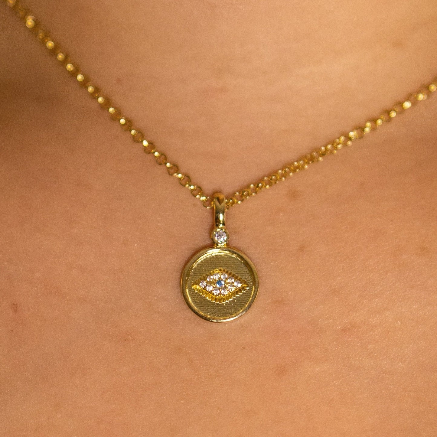 Evil eye necklaces. Evil eye jewelry. 18k gold plated necklace. Dainty necklaces. Cute gold plated evil eye necklace. Evil eye gold necklace. Waterproof necklace. Durable necklace. Cute jewelry. Affordable jewelry. Small business jewelry.