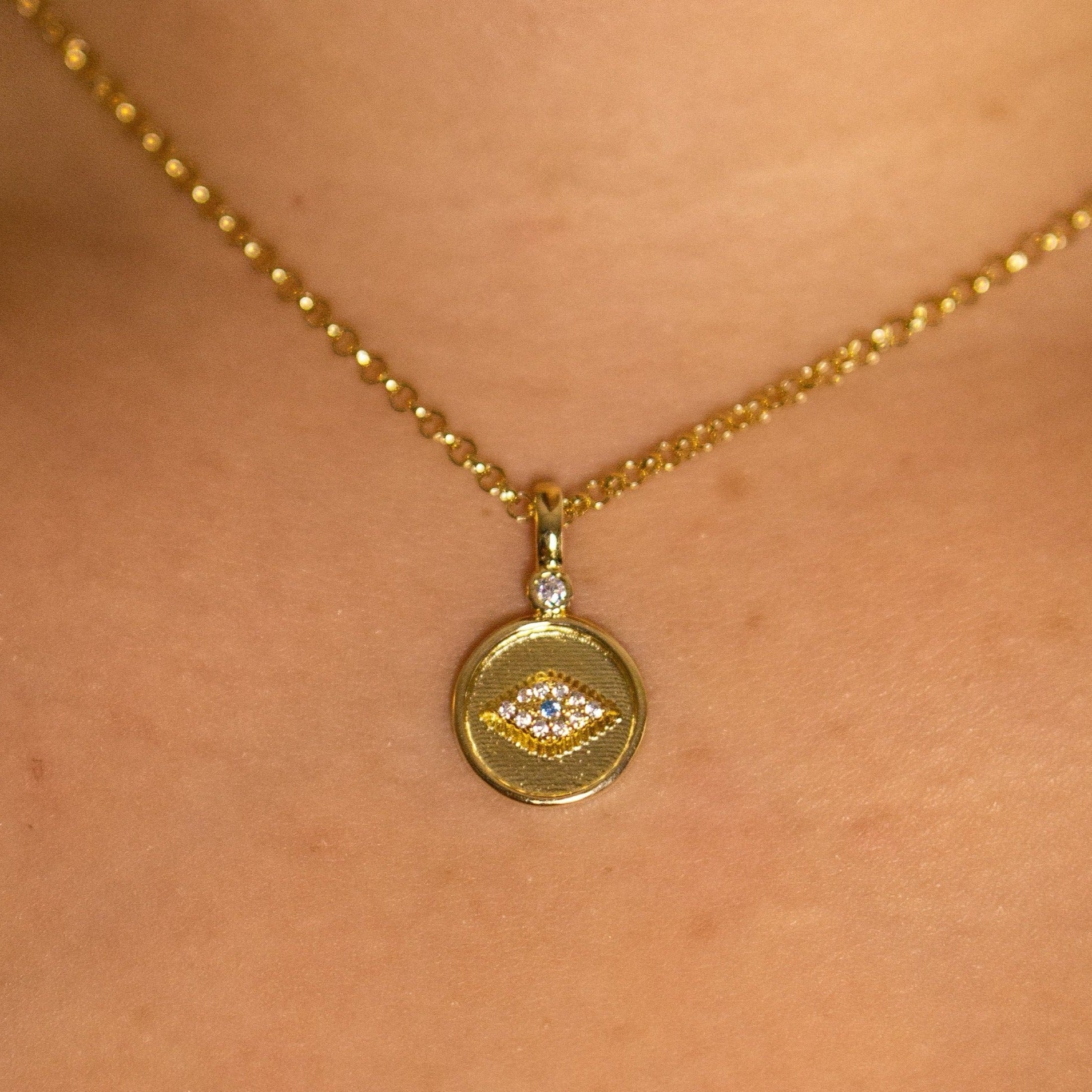 Evil eye necklaces. Evil eye jewelry. 18k gold plated necklace. Dainty necklaces. Cute gold plated evil eye necklace. Evil eye gold necklace. Waterproof necklace. Durable necklace. Cute jewelry. Affordable jewelry. Small business jewelry. 