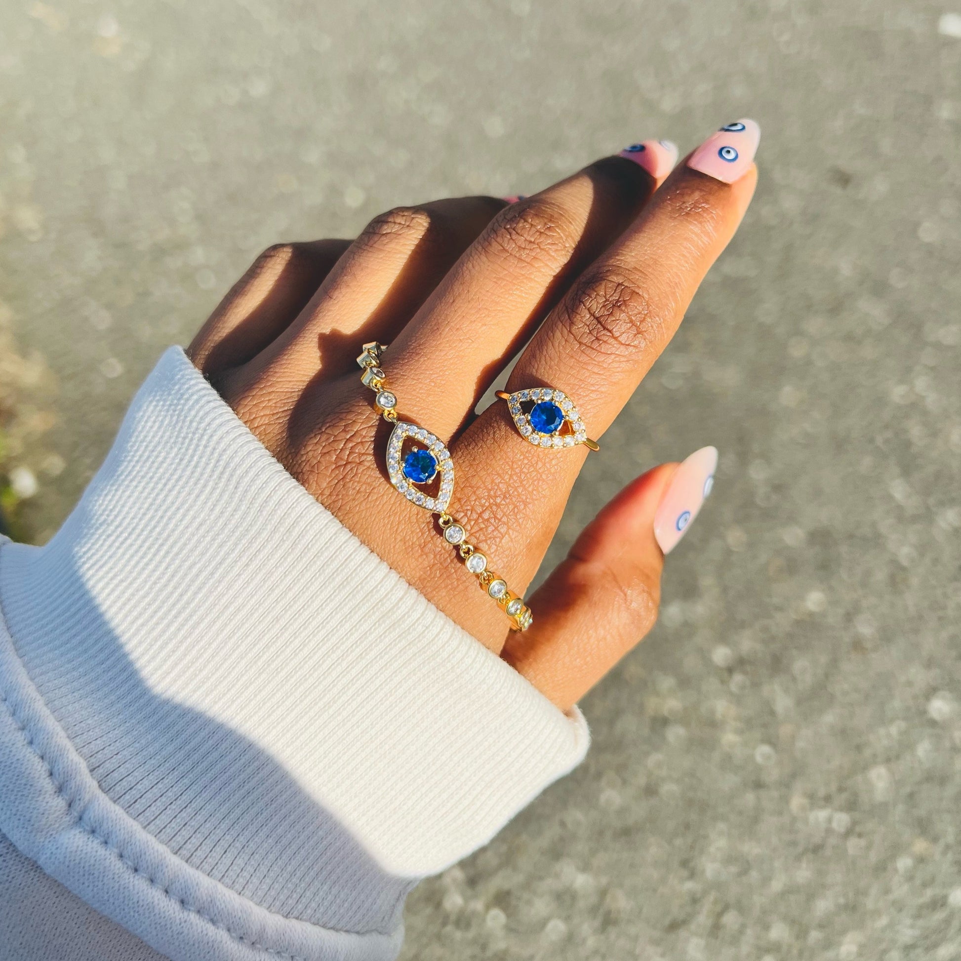 Evil Eye Ring. Custom-made Evil Eye Ring that is adjustable, 18k gold Plated, made with shiny Rhinestones and is water-resistant. Evil eye jewelry. Evil eye ring. Evil eye protection. 