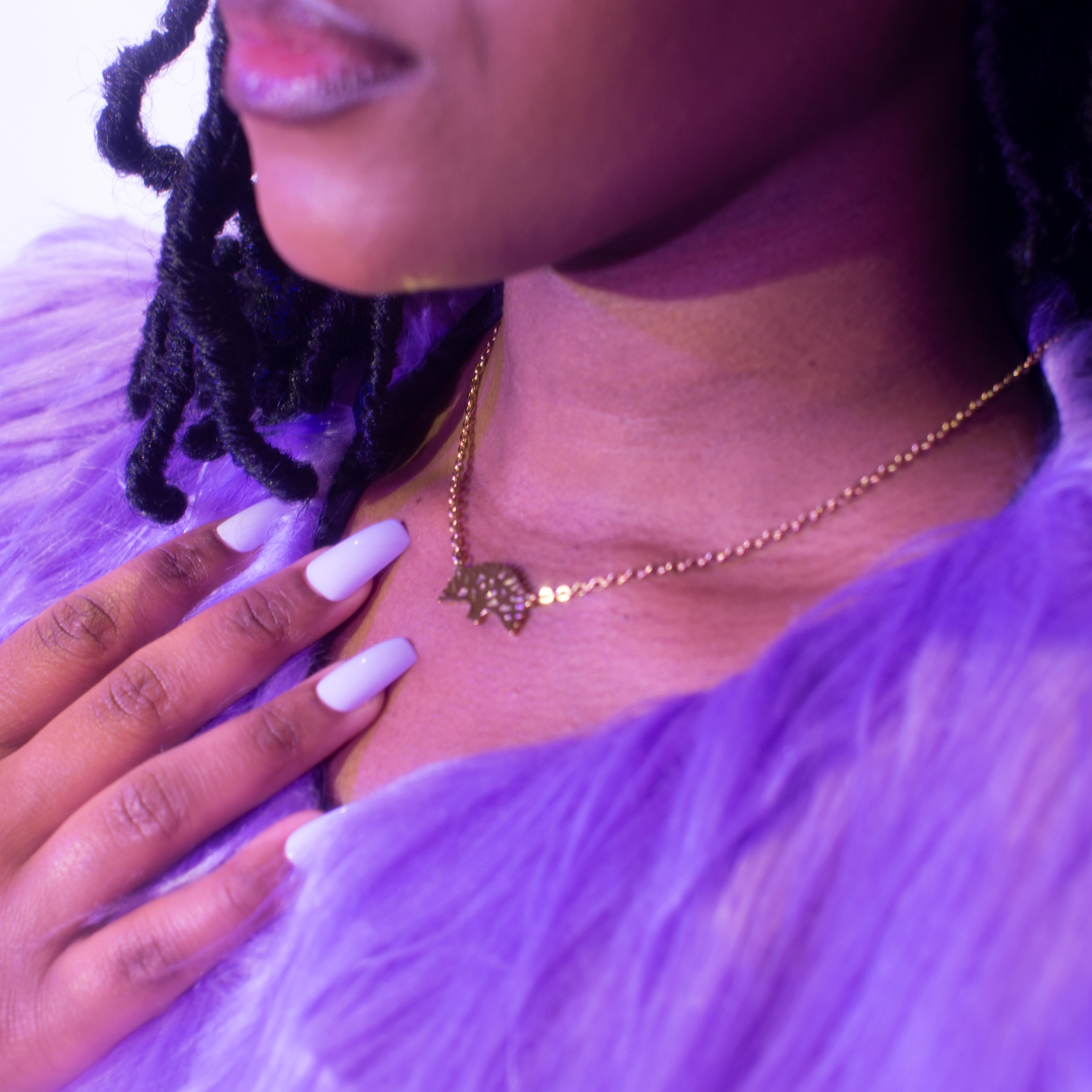 Oakland Tree Set necklace displayed on girl. Oakland Tree necklace. Oakland Tree jewelry. Oakland tree.