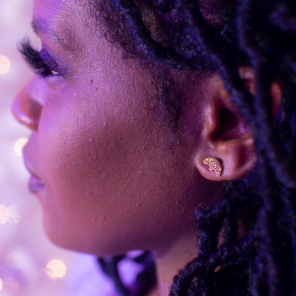 Oakland Tree Set earrings displayed on girl. Oakland Tree earrings. Oakland Tree stud earrings in gold. Oakland Tree jewelry. Oakland tree.